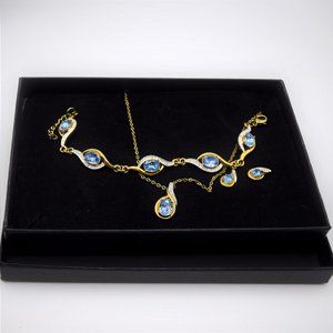 Blue Topaz Crystals Set in Gold Tone Necklace Earrings Bracelet Set Parure